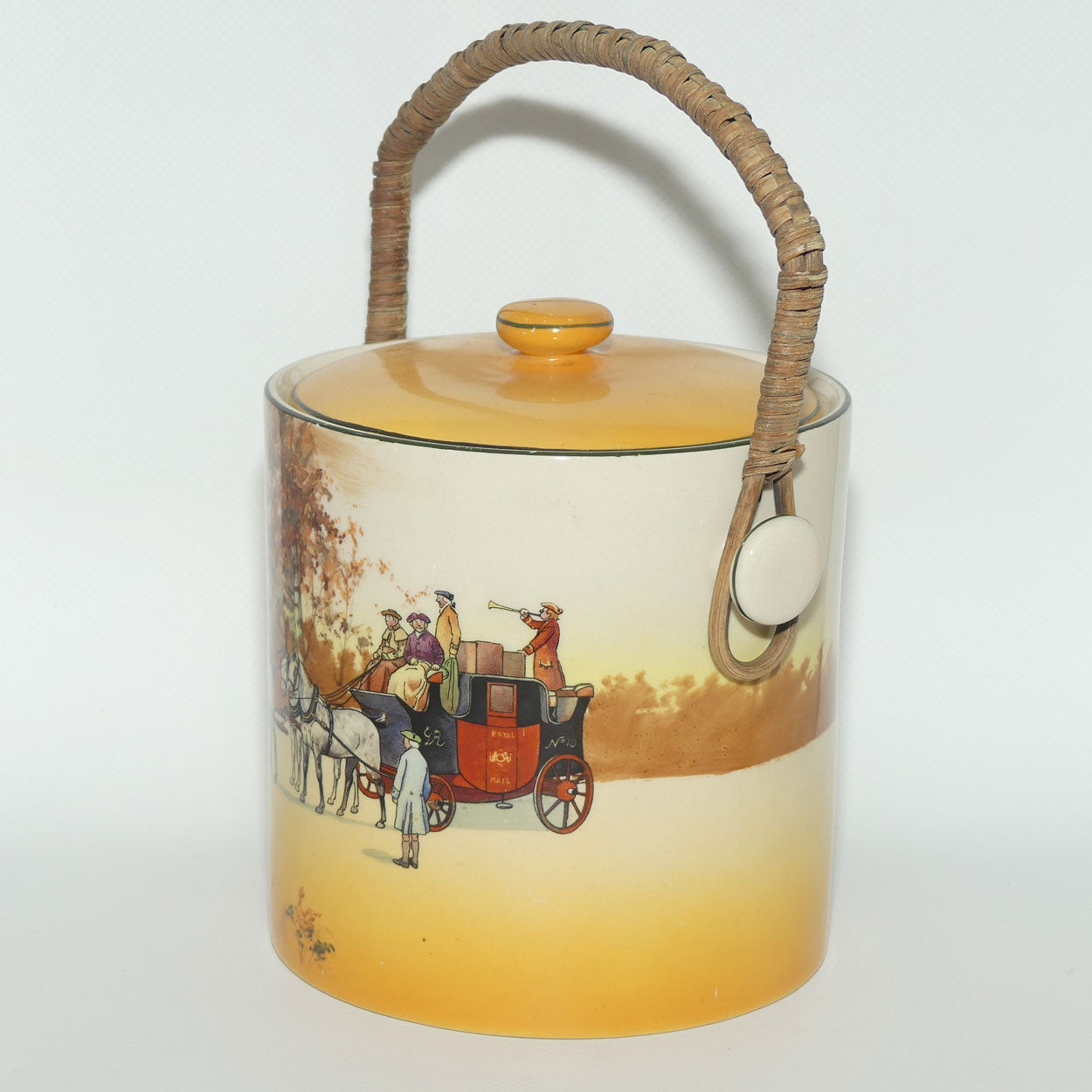 Royal Doulton Coaching Days biscuit barrel with wicker handle