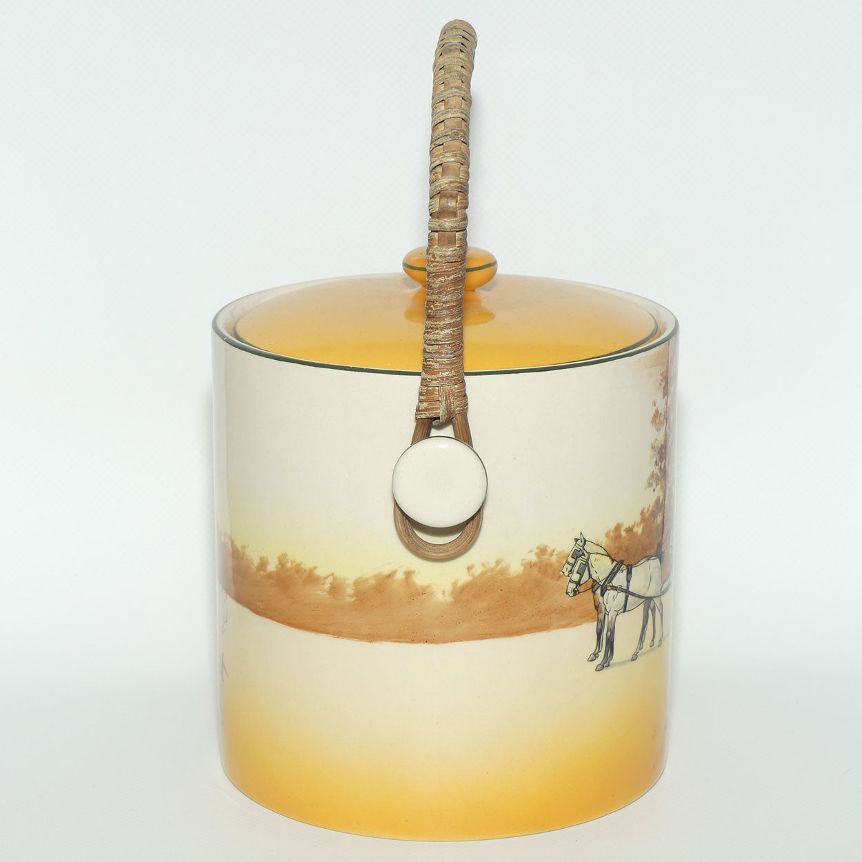Royal Doulton Coaching Days biscuit barrel with wicker handle
