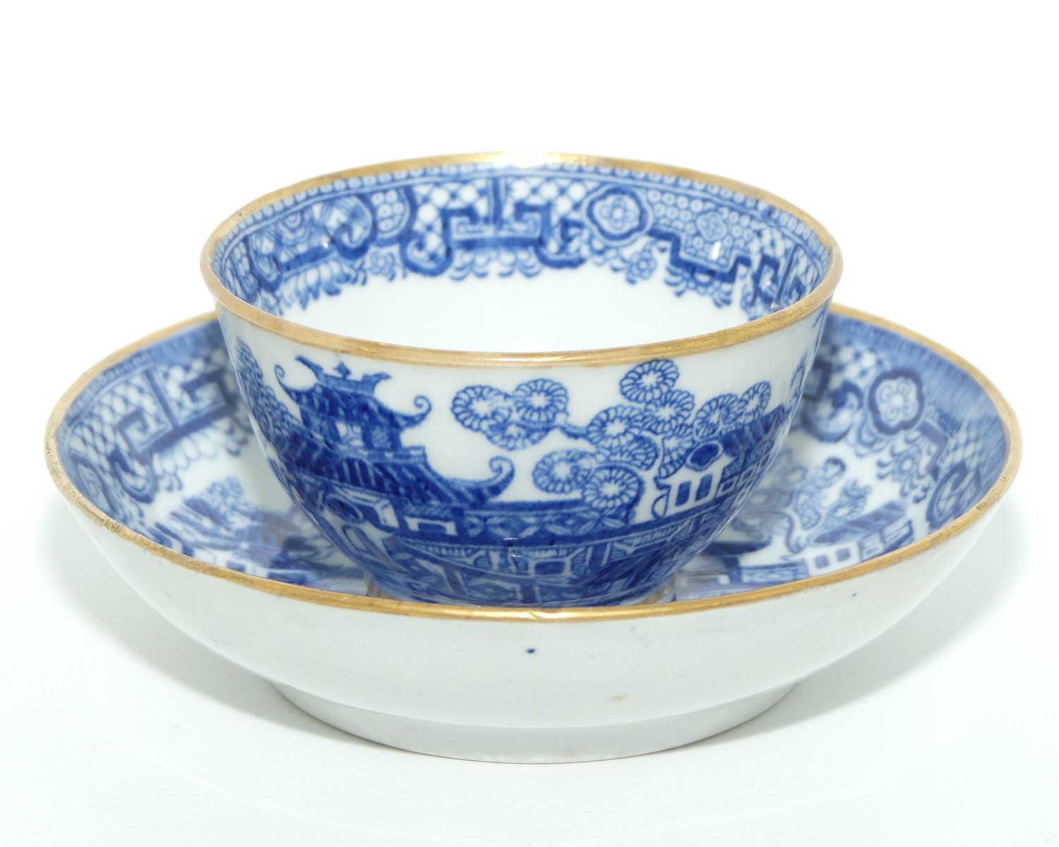 Gilded Blue and White tea bowl and saucer c.1790