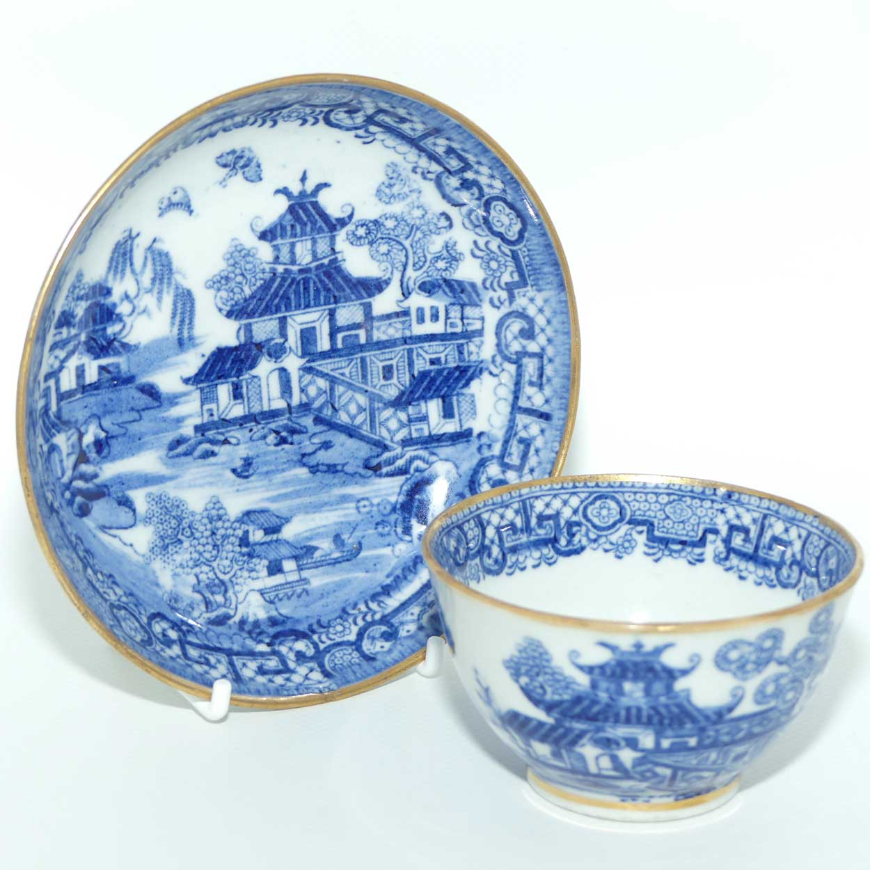 Gilded Blue and White tea bowl and saucer c.1790