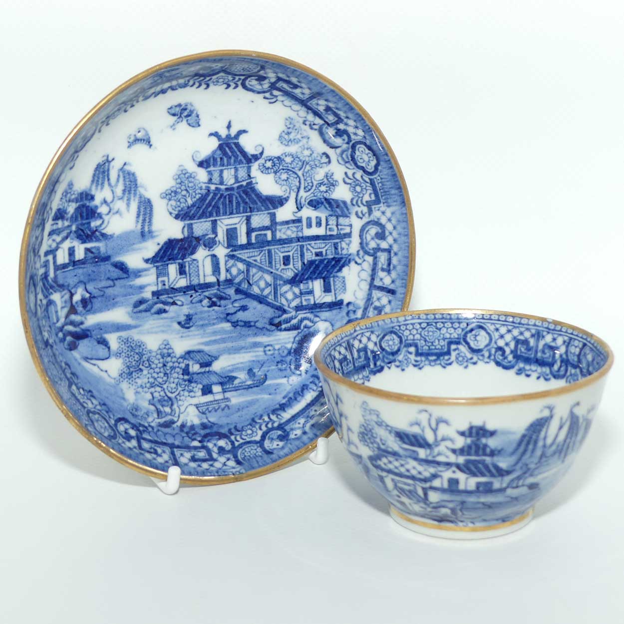 Gilded Blue and White tea bowl and saucer c.1790