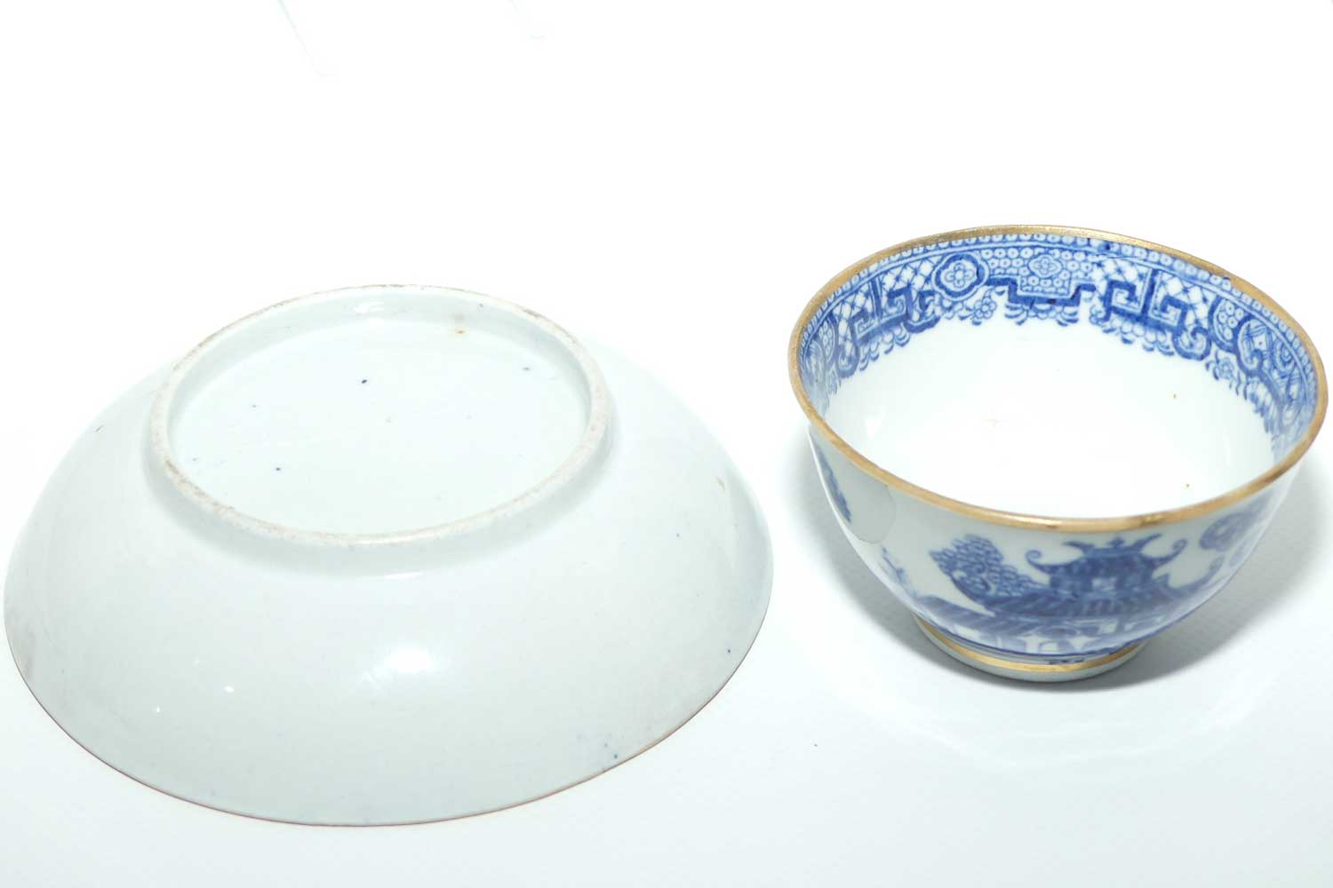 Gilded Blue and White tea bowl and saucer c.1790