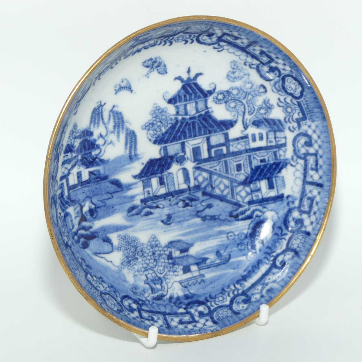 Gilded Blue and White tea bowl and saucer c.1790