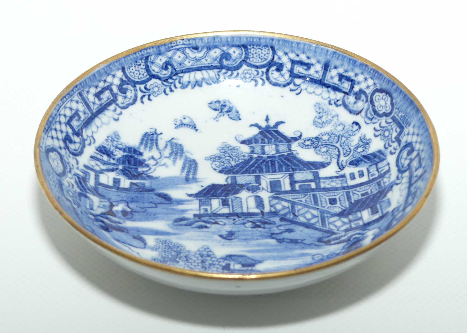 Gilded Blue and White tea bowl and saucer c.1790