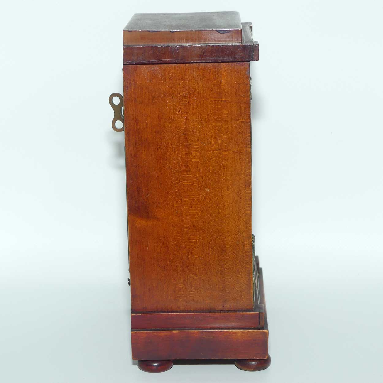 Wurttemburg Crossed Arrows Mahogany case mantle clock with Neoclassical brass decoration