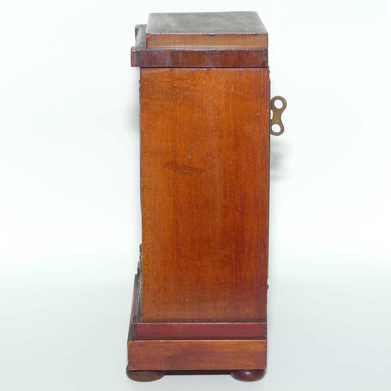 Wurttemburg Crossed Arrows Mahogany case mantle clock with Neoclassical brass decoration