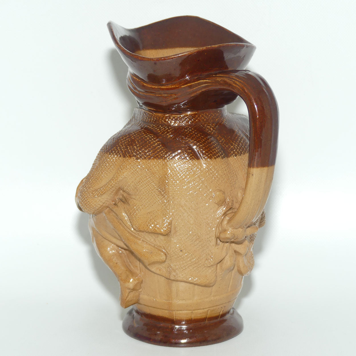 X6365 Doulton Lambeth Toby XX toby jug | Hand holds jug of Ale