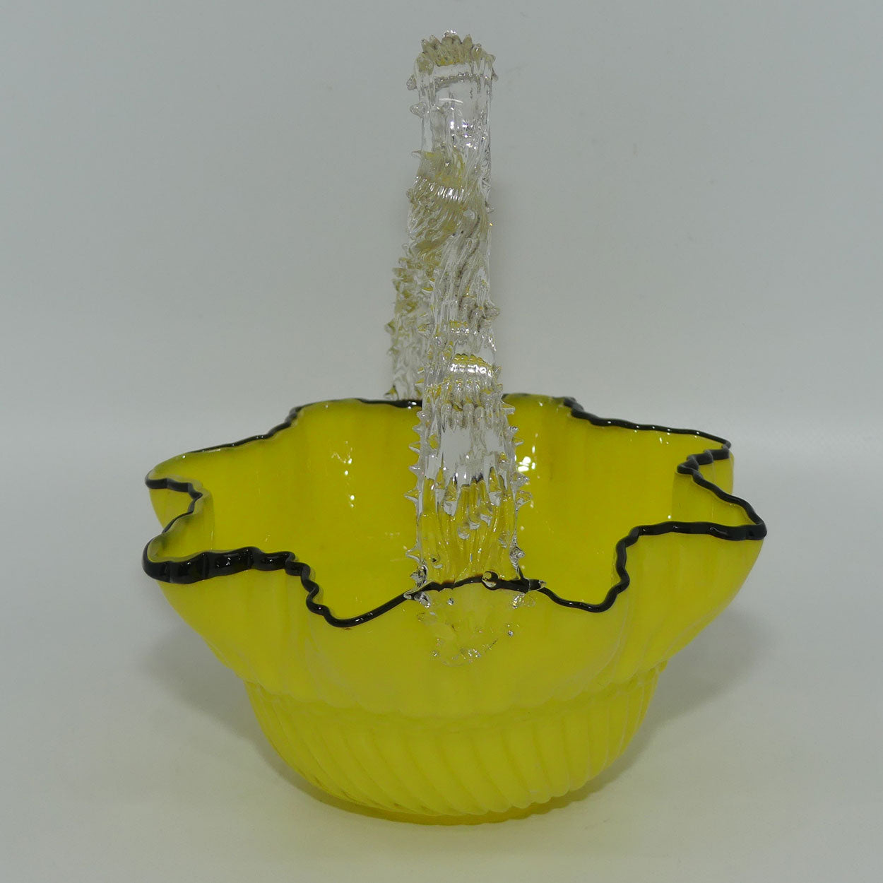 yellow-glass-with-black-edge-thorn-handle-basket