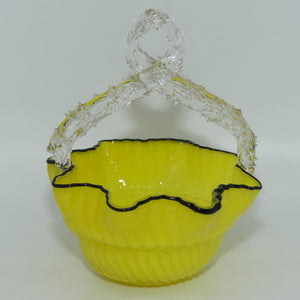 yellow-glass-with-black-edge-thorn-handle-basket