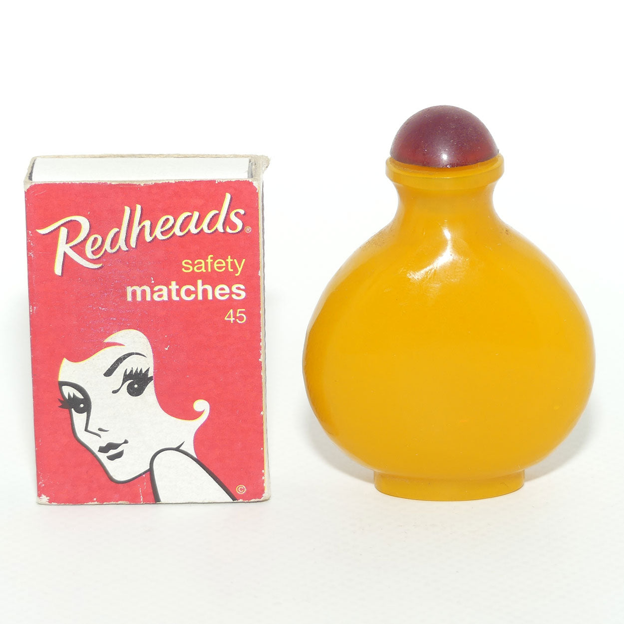 Chinese Snuff bottle | Butterscotch Glass with Red Stopper