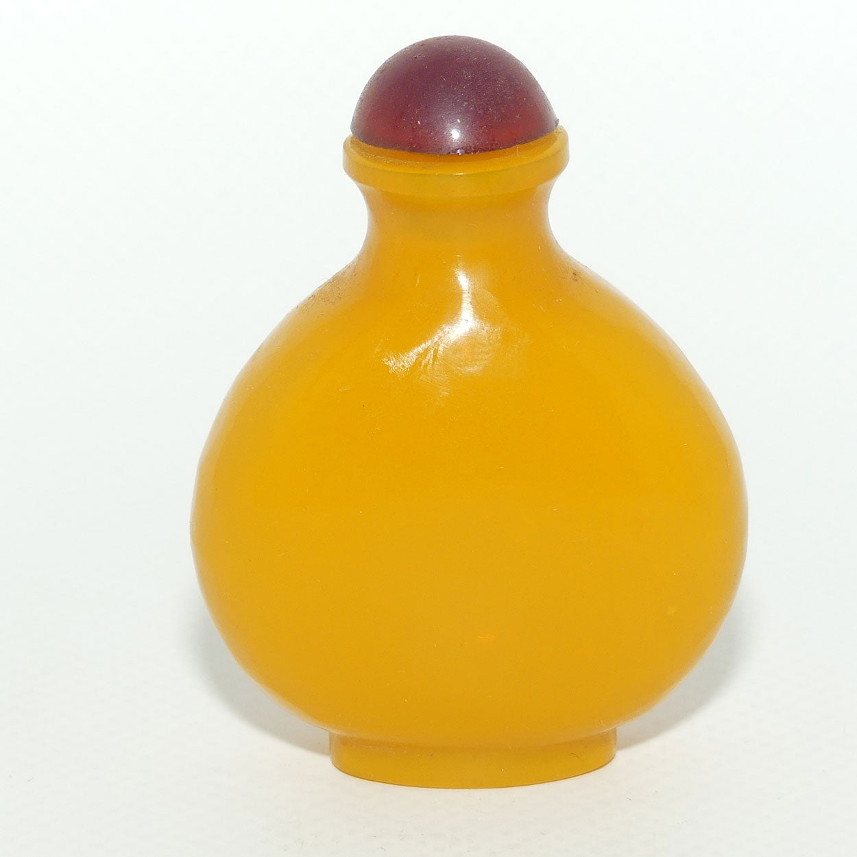 Chinese Snuff bottle | Butterscotch Glass with Red Stopper