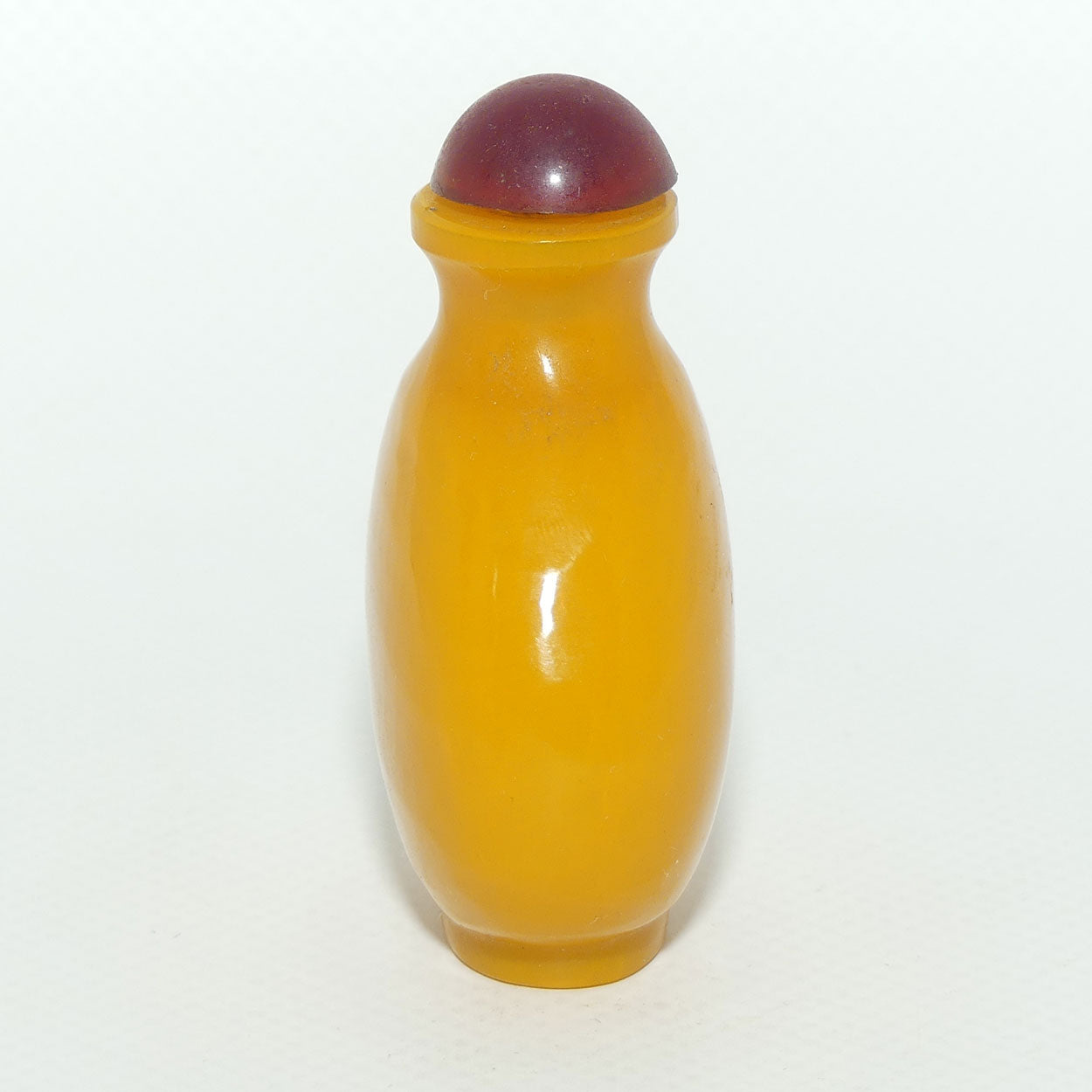 Chinese Snuff bottle | Butterscotch Glass with Red Stopper
