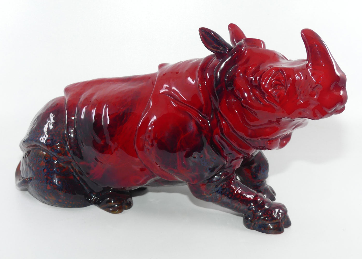 #615 Royal Doulton Flambe Rhinoceros Lying 