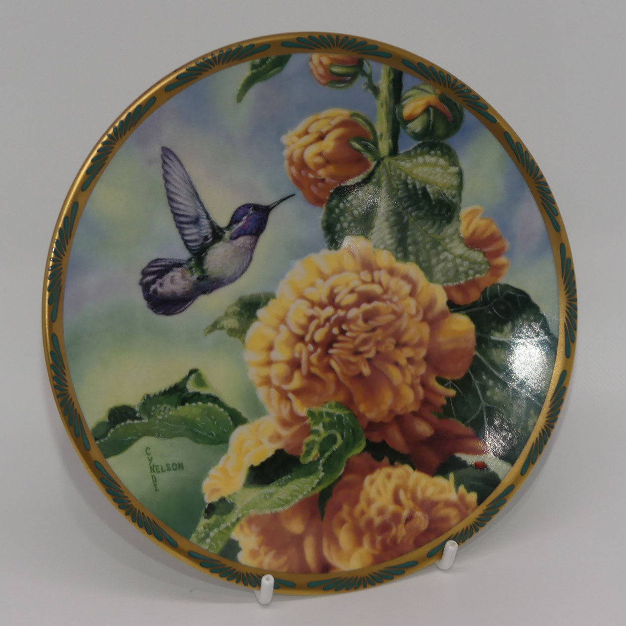 bradex-84-p29-22-8-plate-gems-of-nature-costs-hummingbird-and-hollyhocks