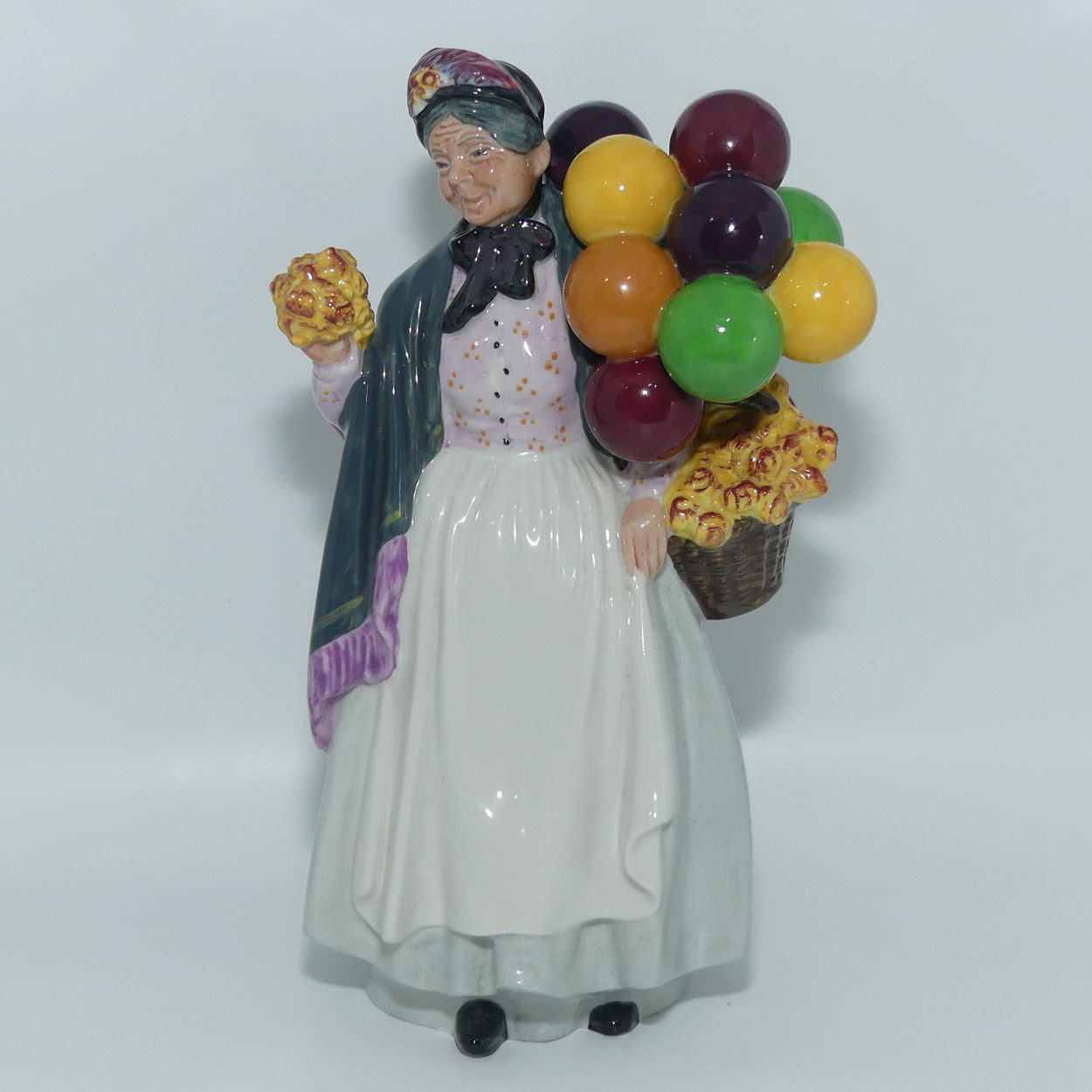 HN1843 Royal Doulton figurine Biddy Penny Farthing | Character Figures