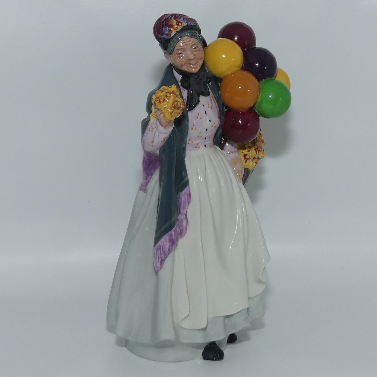 HN1843 Royal Doulton figurine Biddy Penny Farthing | Character Figures