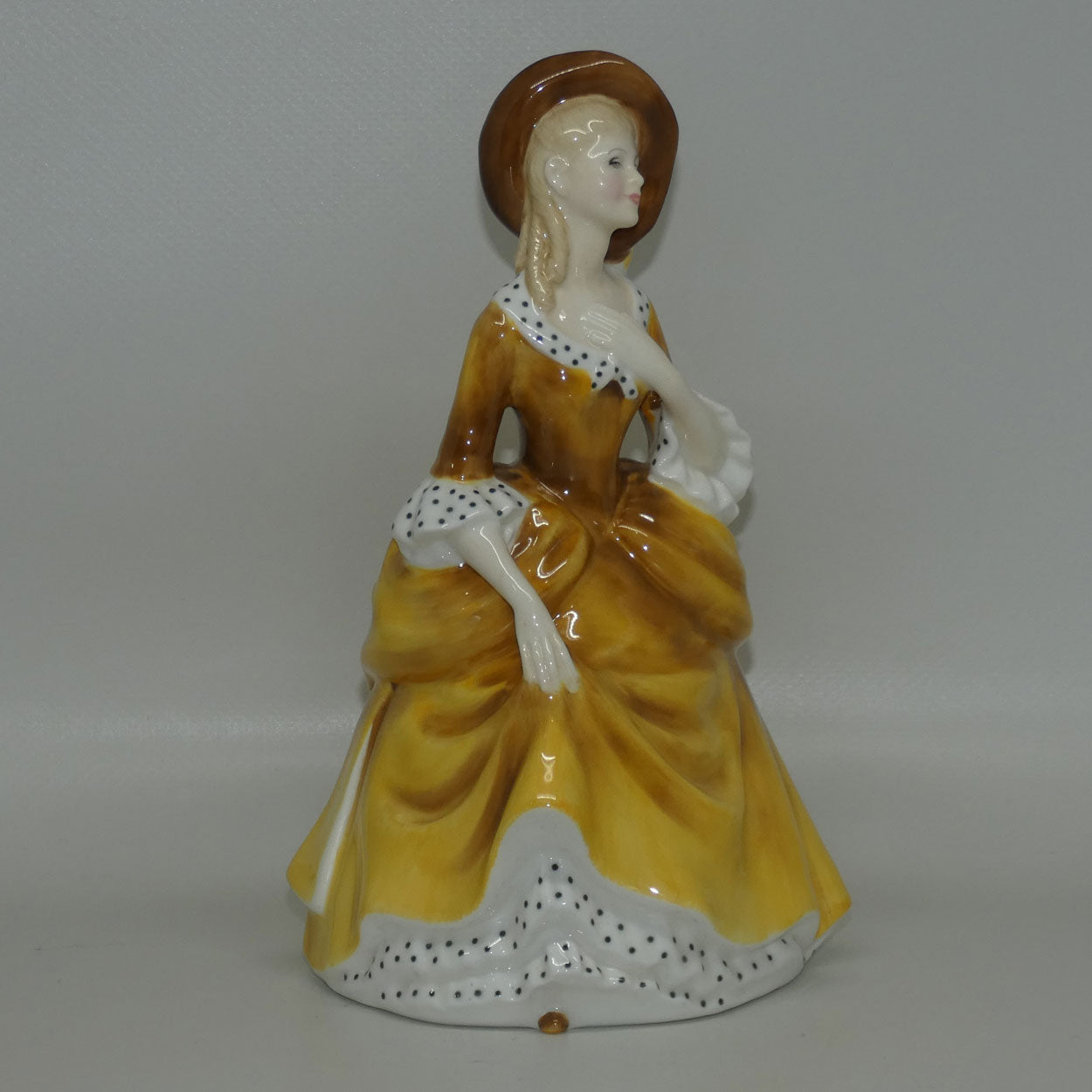 hn2275-royal-doulton-figure-sandra-gold
