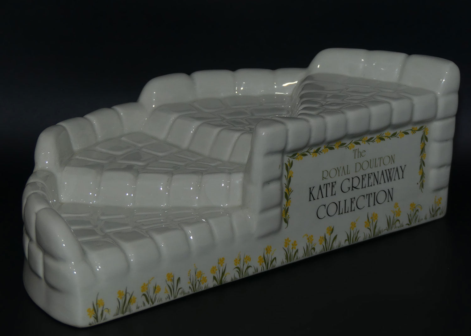 Royal Doulton display stand for the Kate Greenaway Collection figurines