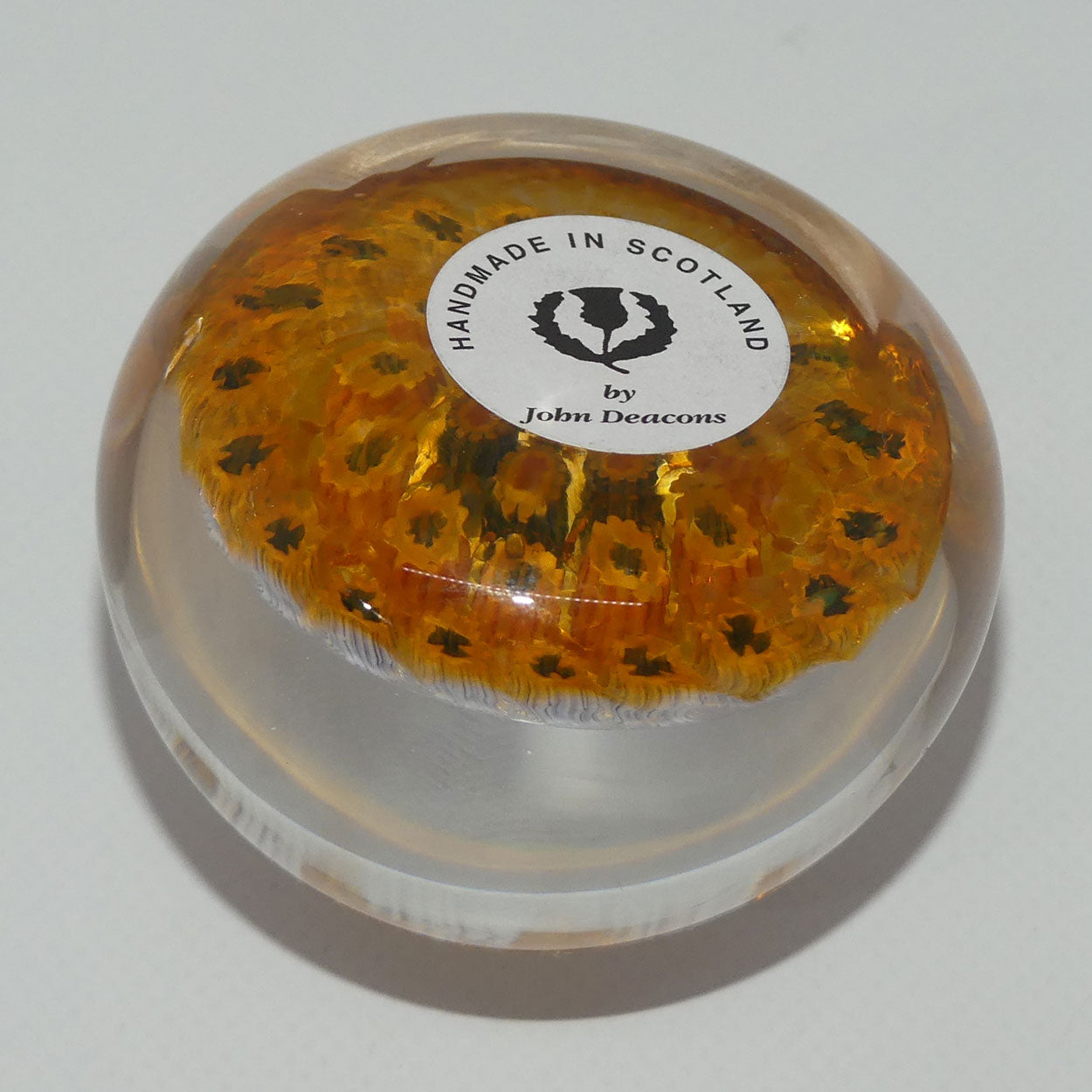 john-deacons-scotland-millefiori-concentric-miniature-paperweight-amber