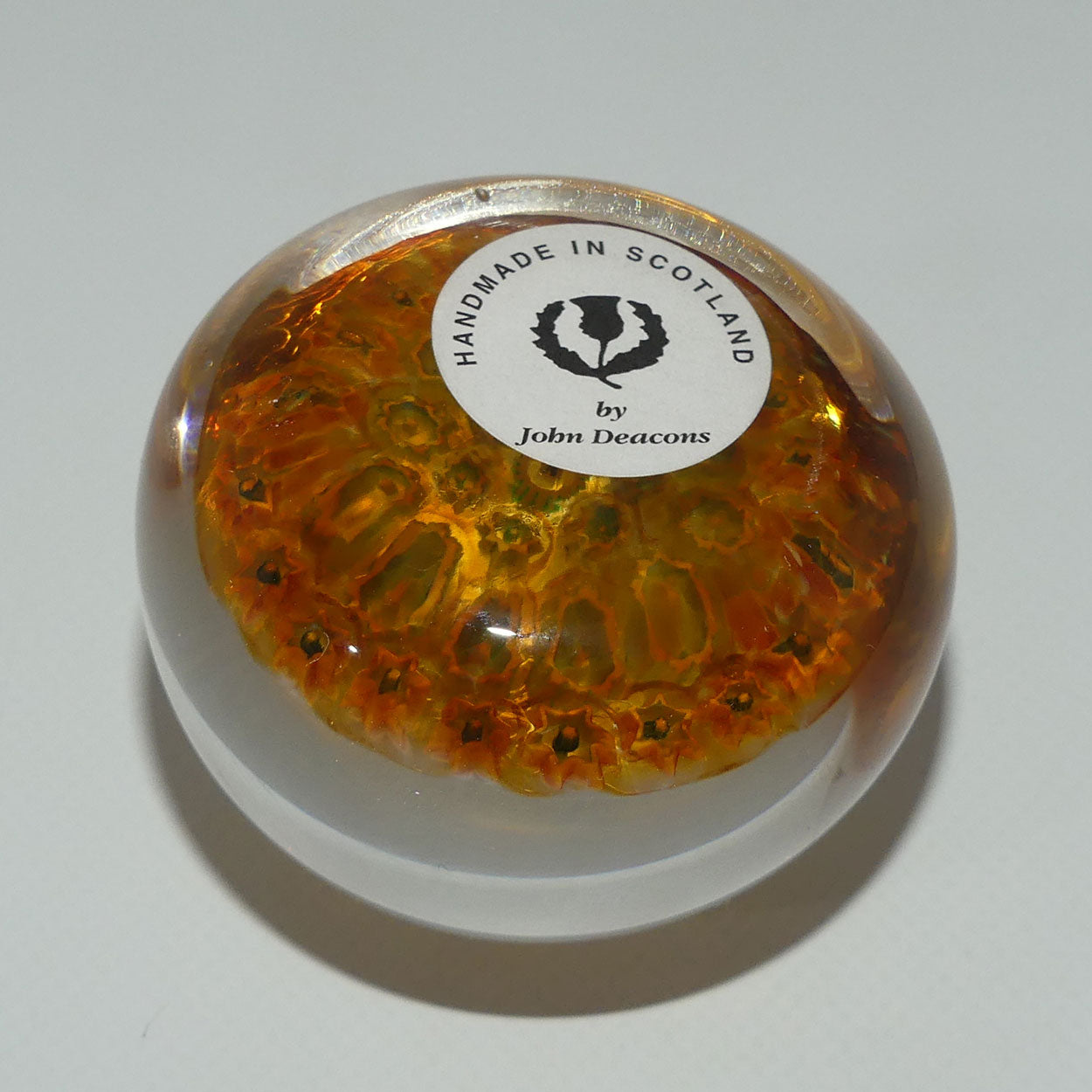john-deacons-scotland-millefiori-silhouette-cane-miniature-paperweight-amber