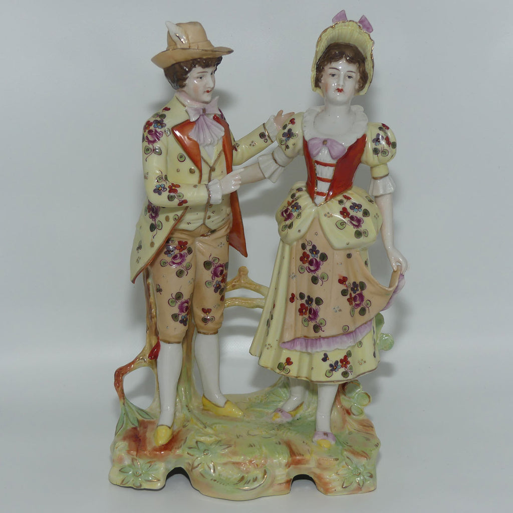 Victorian era Lady and Gent bisque figurine group | c.1890