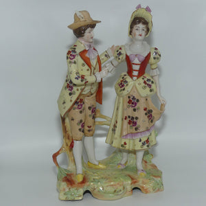 Victorian era Lady and Gent bisque figurine group | c.1890