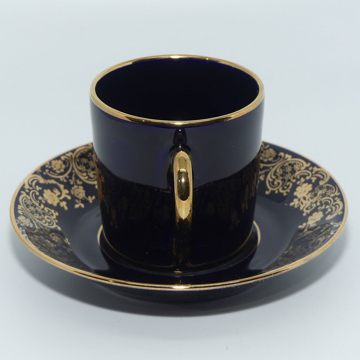Limoges Castel France Blue and Gilt demi tasse duo
