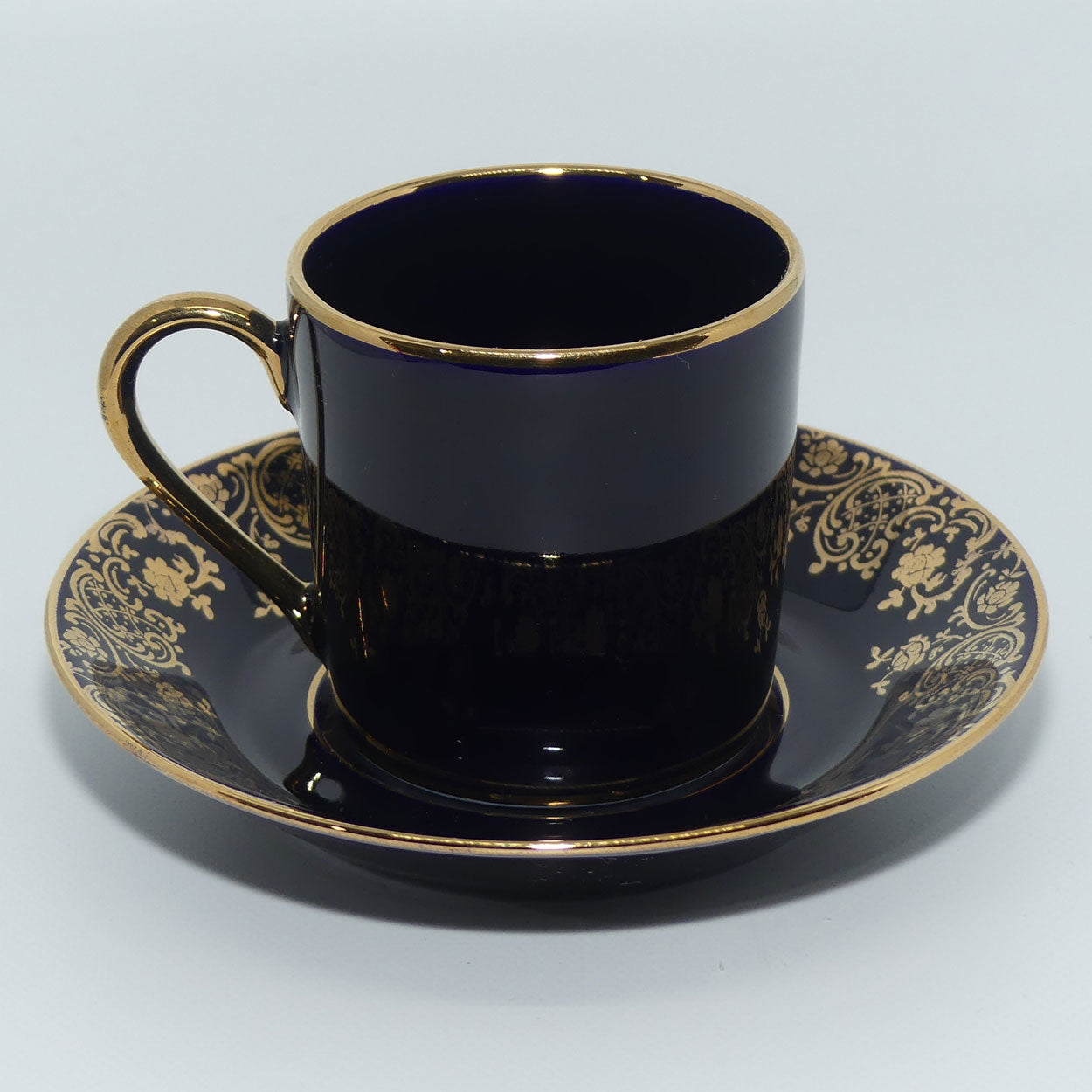 Limoges Castel France Blue and Gilt demi tasse duo