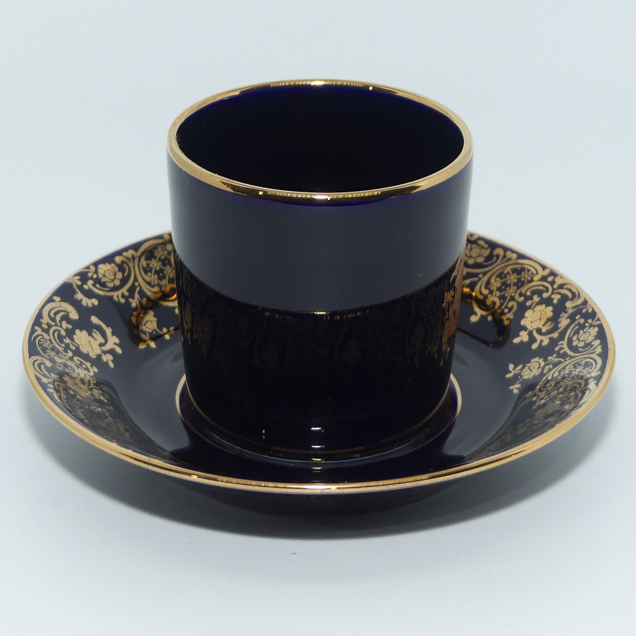Limoges Castel France Blue and Gilt demi tasse duo