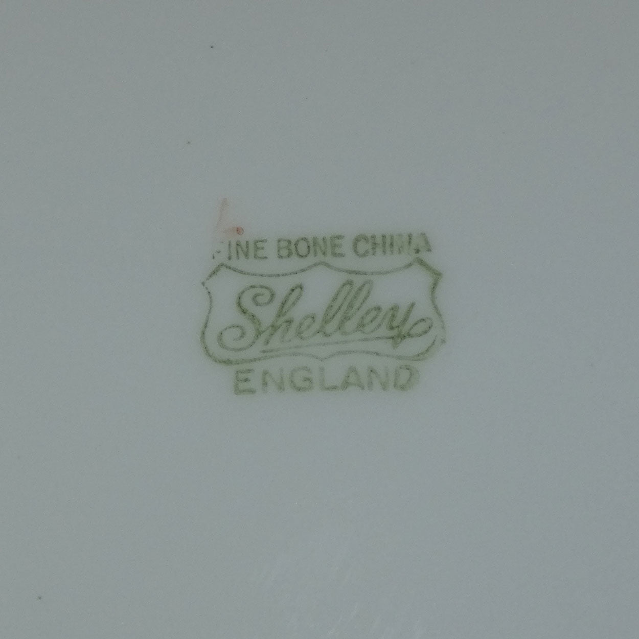 shelley-england-courting-scene-plate-lady-standing-green-border-dainty