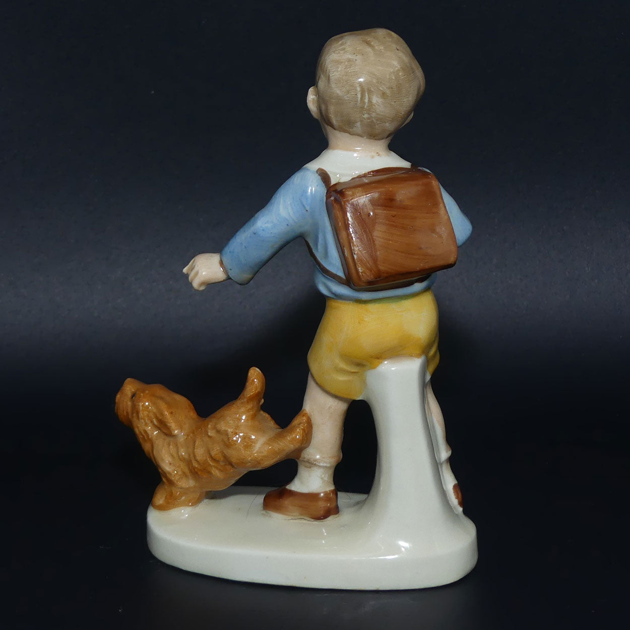 carl-scheidig-kunstporzellan-germany-schoolboy-with-dog-figurine