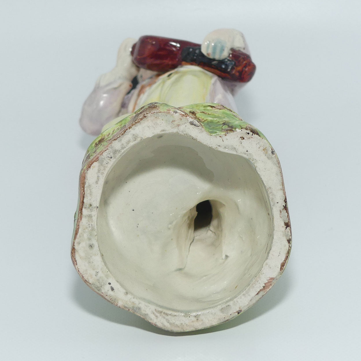 19th Cent English Pottery Man in Hat Carrying Instrument